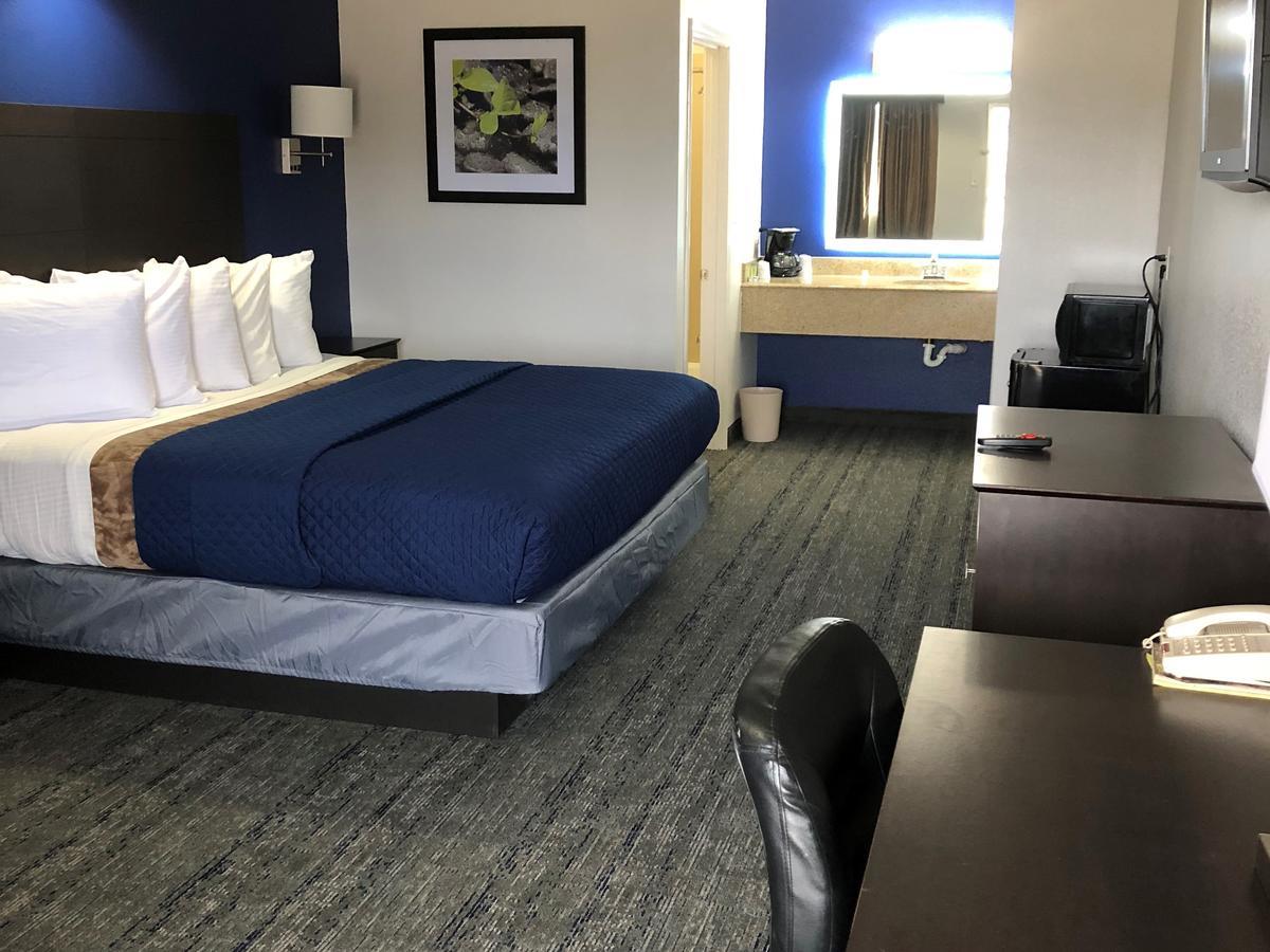 Executive Inn And Suites Joaquin מראה חיצוני תמונה