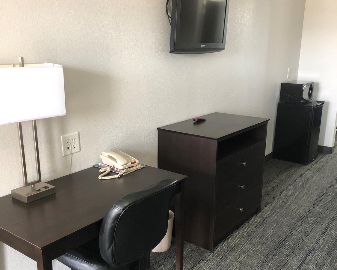 Executive Inn And Suites Joaquin מראה חיצוני תמונה